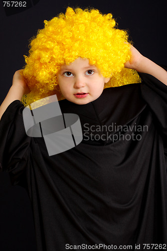 Image of Cute boy in yellow wig