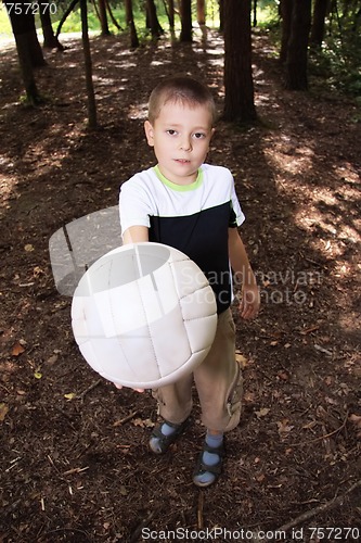Image of Boy giving ball
