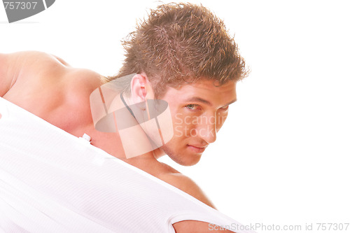 Image of Guy tearing shirt
