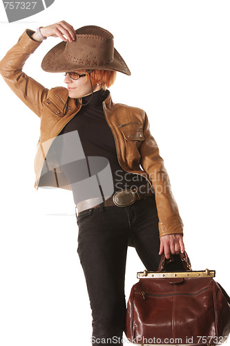 Image of Redhead traveller with brown bag