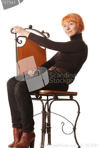 Image of Redhead in casual sitting on chair