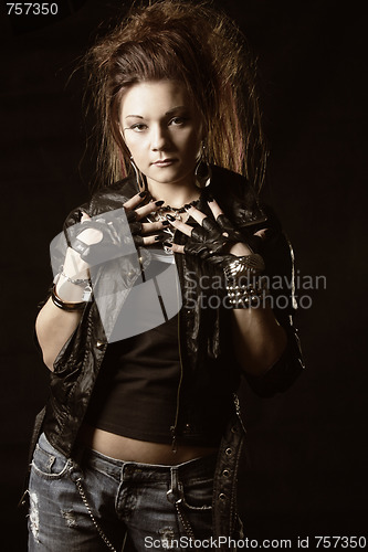 Image of Woman in black jacket and jeans