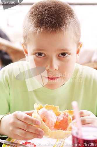 Image of Kid with pink ice-cream