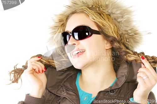 Image of Smiling woman with braids in sunglasses