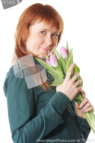Image of Redhead in green with pink tulips