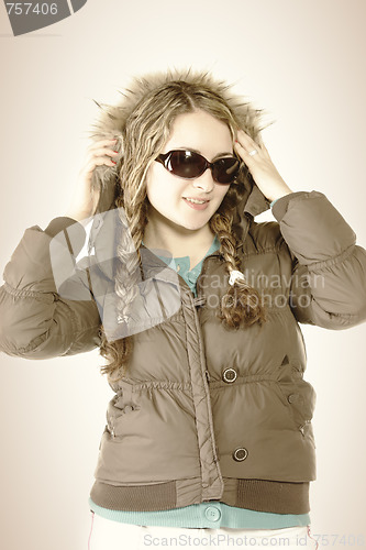Image of Woman in brown winter jacket