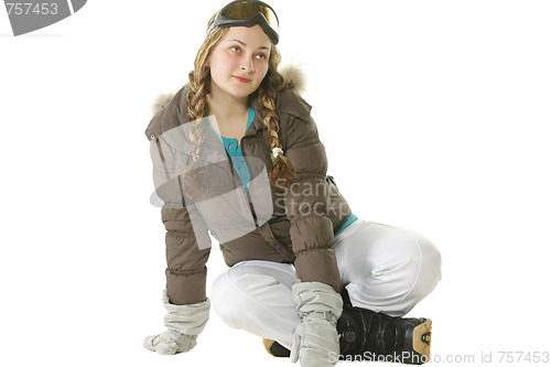 Image of Snowboarder woman sitting on white