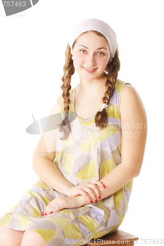 Image of Smiling woman on small bench