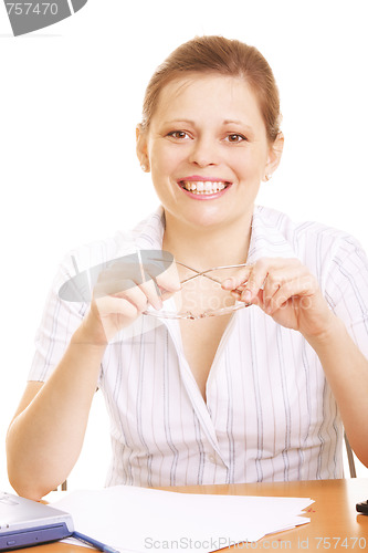 Image of Smiling woman holding spectacles