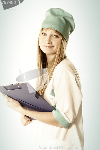 Image of Smiling blonde doctor with folder