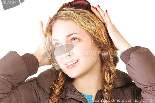 Image of Woman with plaits looking up