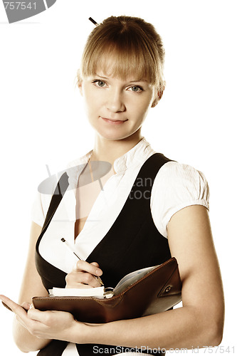 Image of Blonde businesswoman with open notepad