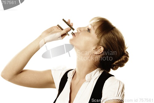 Image of Blonde drinking from flask