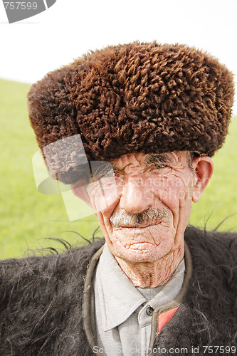 Image of Old man in traditional clothes