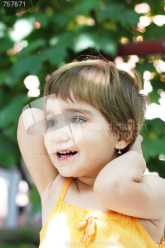 Image of Smiling girl in yellow