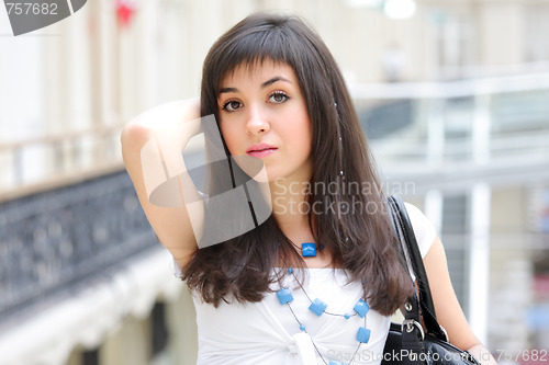 Image of Brunette in shopping centre