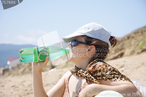 Image of Drinking water on beach