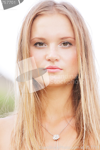 Image of Serious blonde outdoor portrait