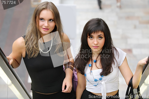 Image of Women on escalator