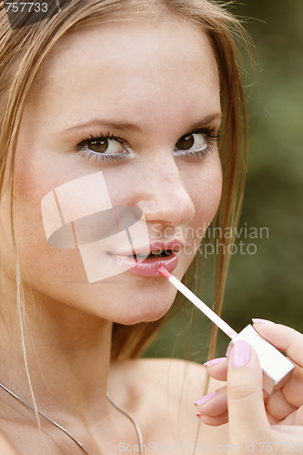 Image of Applying lipstick