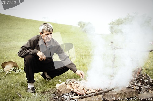 Image of Preparing barbecue