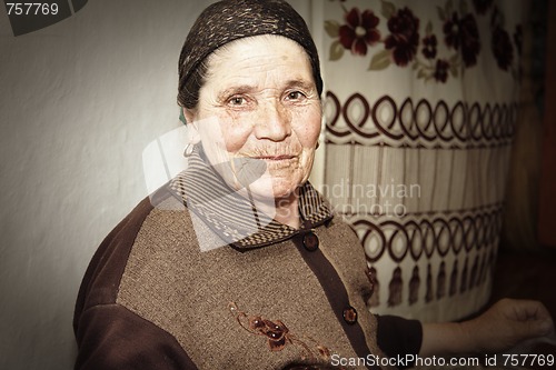 Image of Elderly woman at work