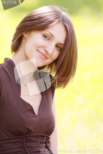 Image of Cute woman in brown
