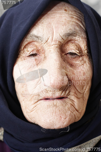 Image of Old woman lost in thoughts