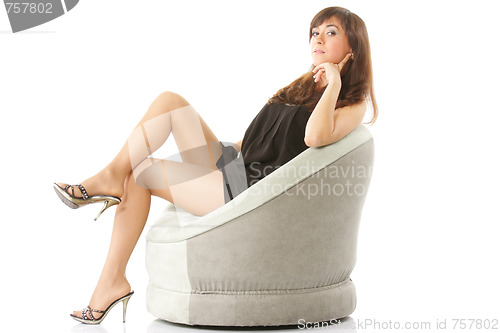 Image of Woman in chair sideview