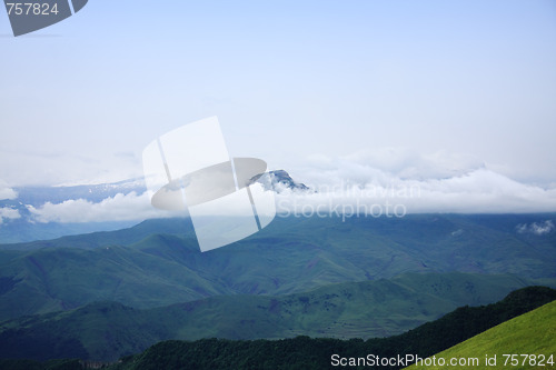 Image of Clouds surrounds mountain peak