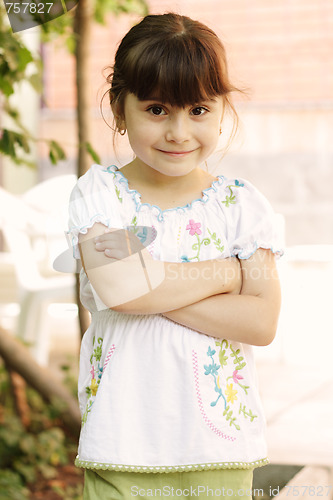 Image of Little girl with folded hands