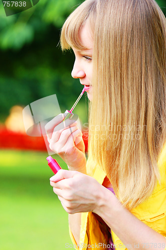 Image of Applying lipstick