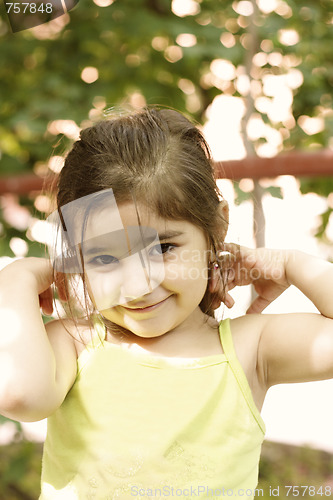 Image of Smiling girl in green