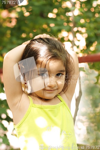 Image of Girl in green outdoors
