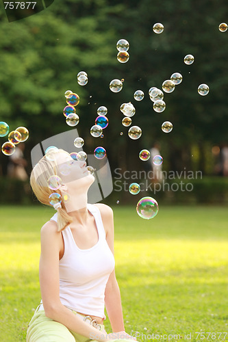 Image of Blonde and soap bubbles