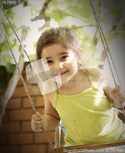 Image of Girl on swings