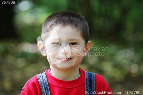 Image of Smiling kid in red