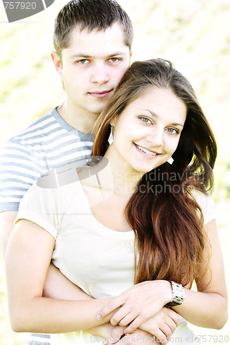 Image of Serious guy and smiling girl