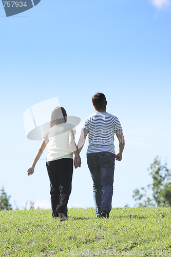 Image of Couple going away