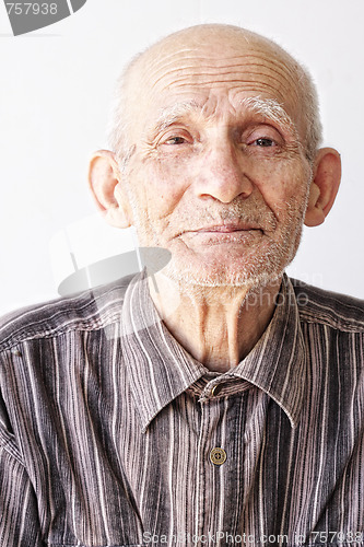 Image of Senior man looks to camera