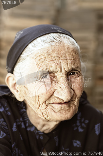 Image of Cunning gaze of senior woman