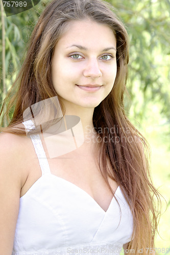 Image of Beautiful girl in white dress