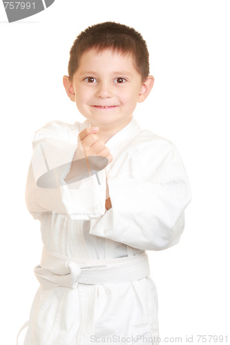 Image of Funny karate kid punches with right fists