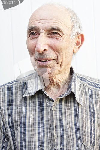 Image of Elderly man looking aside