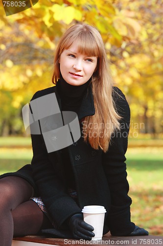 Image of Blonde in black dress