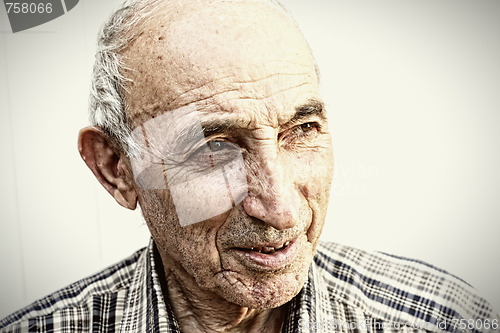 Image of Thoughtful elderly man