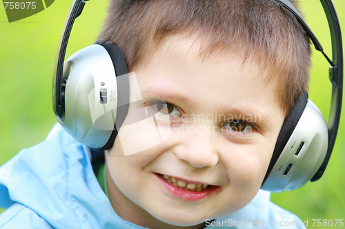 Image of Portrait of boy in headphones