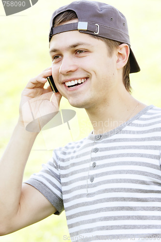 Image of Smiling guy with phone