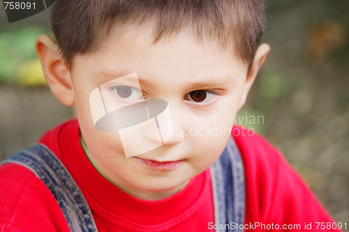 Image of Serene kid in red