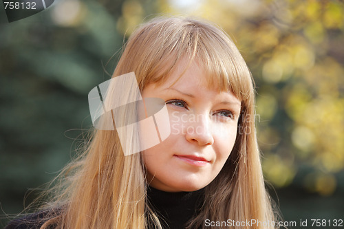 Image of Blonde in autumn sunlight